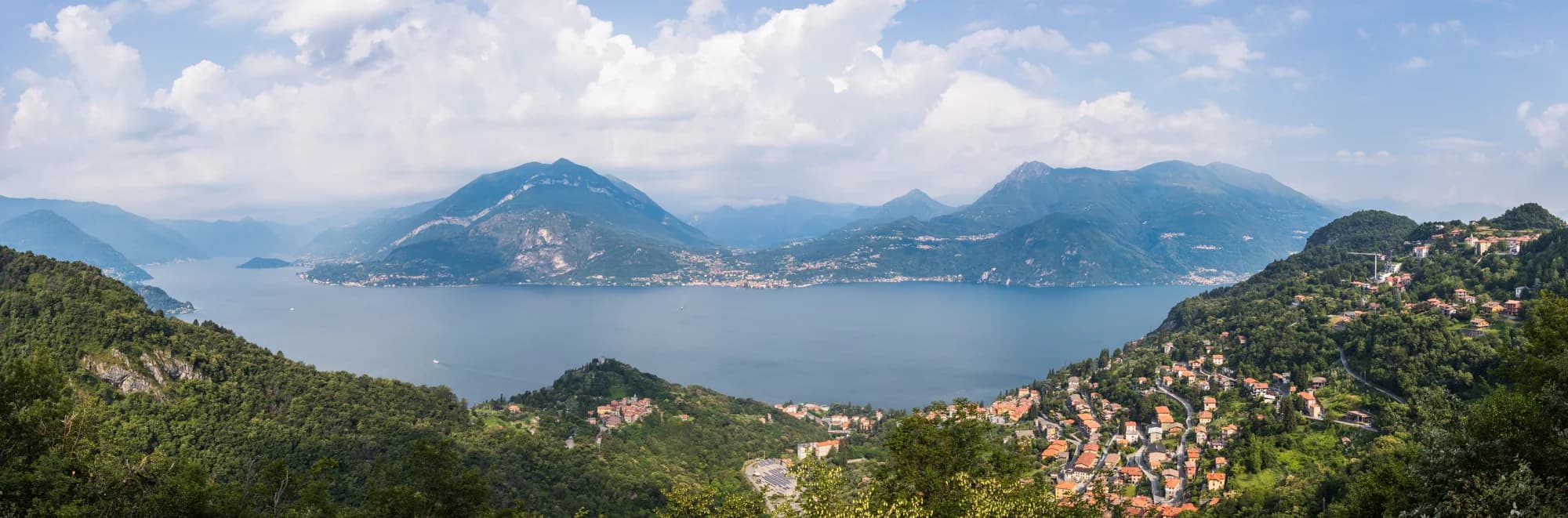 The classic view of Lake Como from above Bellagio, the inverted-Y glacier lake spreading beneath the Alps