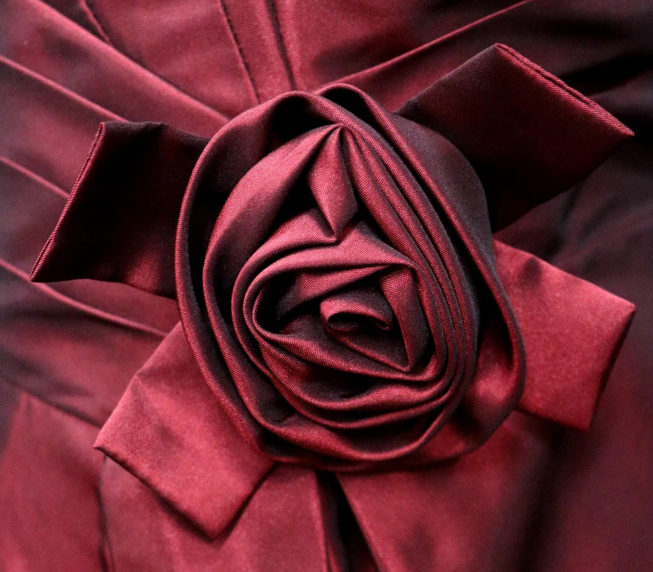 Intricate gold embroidery and hand-woven silk fabric detail