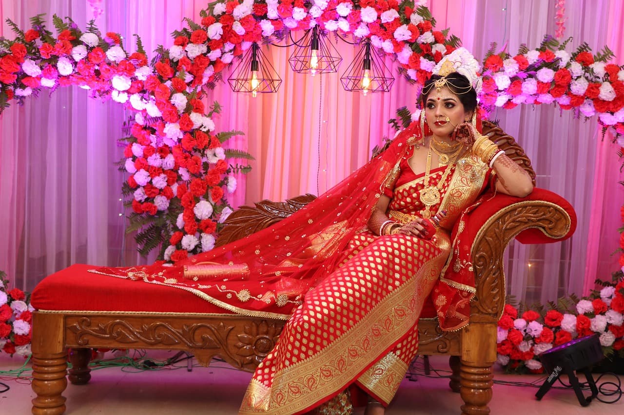 Intricate bridal jewellery and embroidered wedding attire